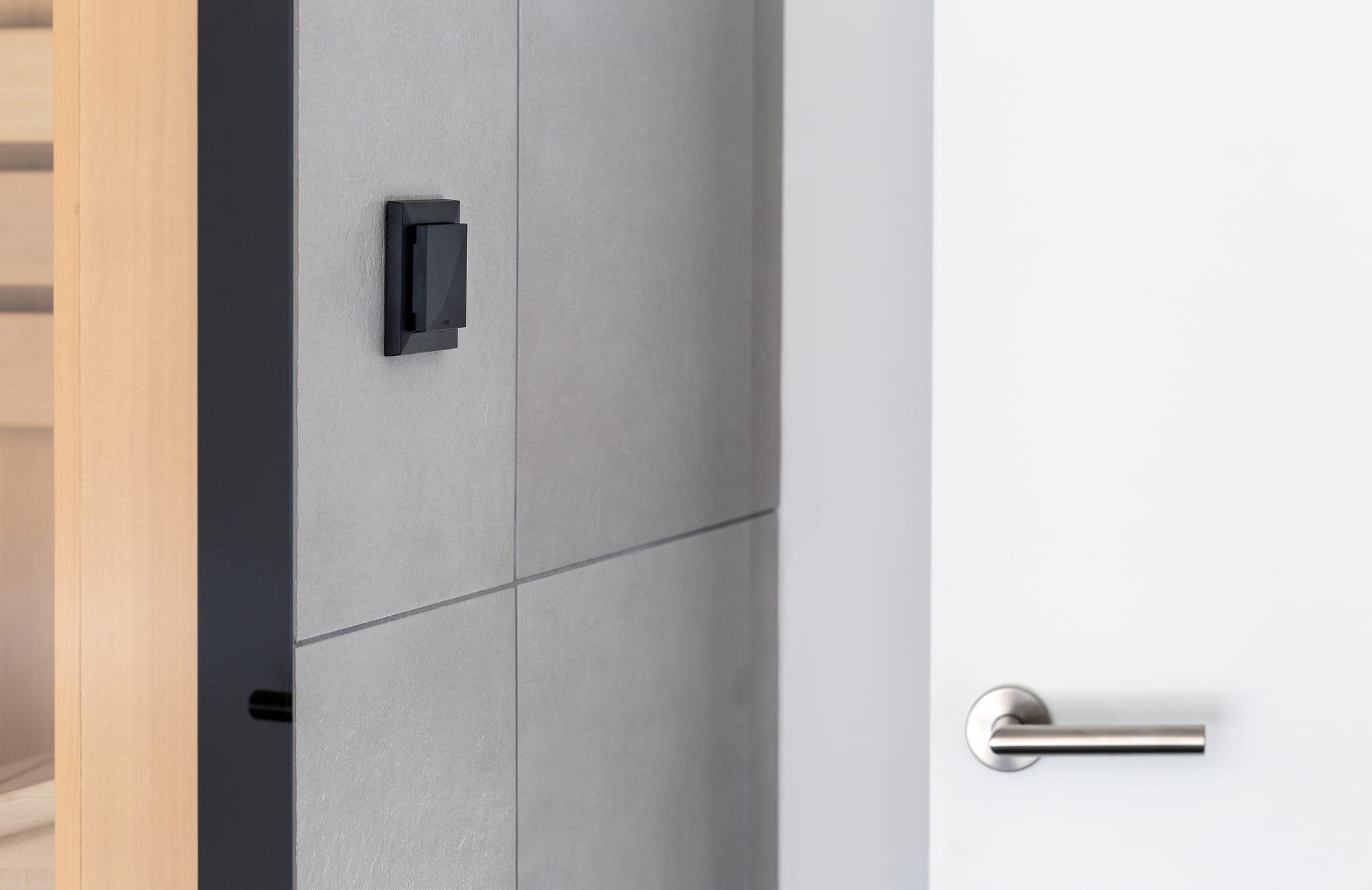 Room comfort sensor measuring temperature and humidity on a wall